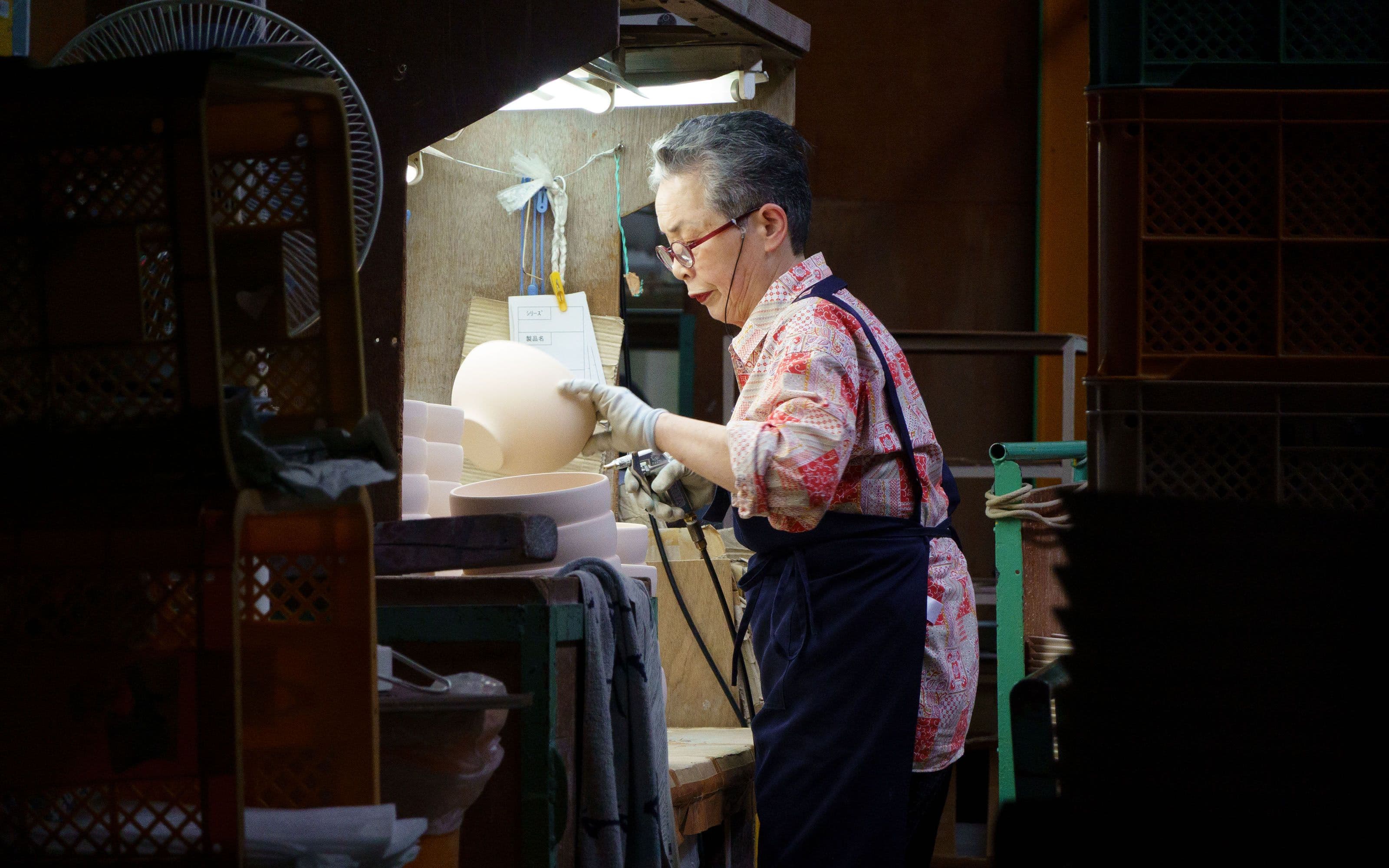 Lady working at the factory
